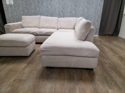PRACHTIG BEIGE RIBSTOF HOEKBANK met POEF