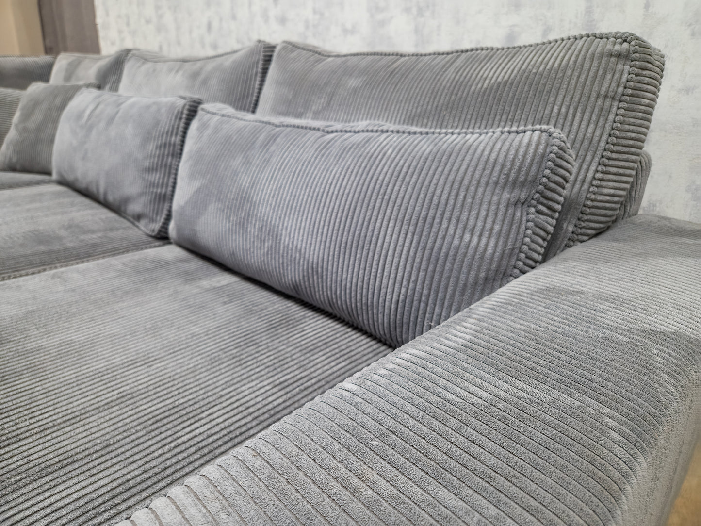 Antraciet Ribstof Hoekbank –  Zacht, Stijlvol en Comfortabel